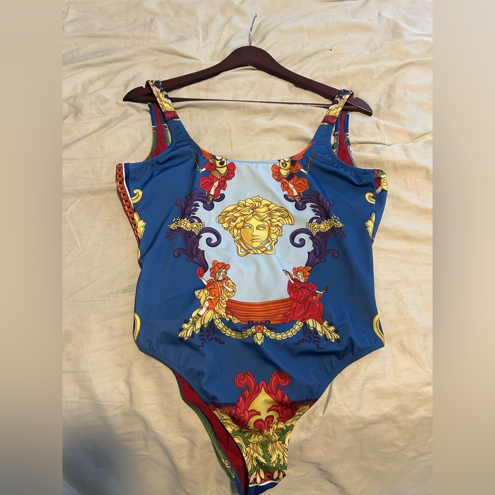 I am selling a Versace Swimsuit in a size 4